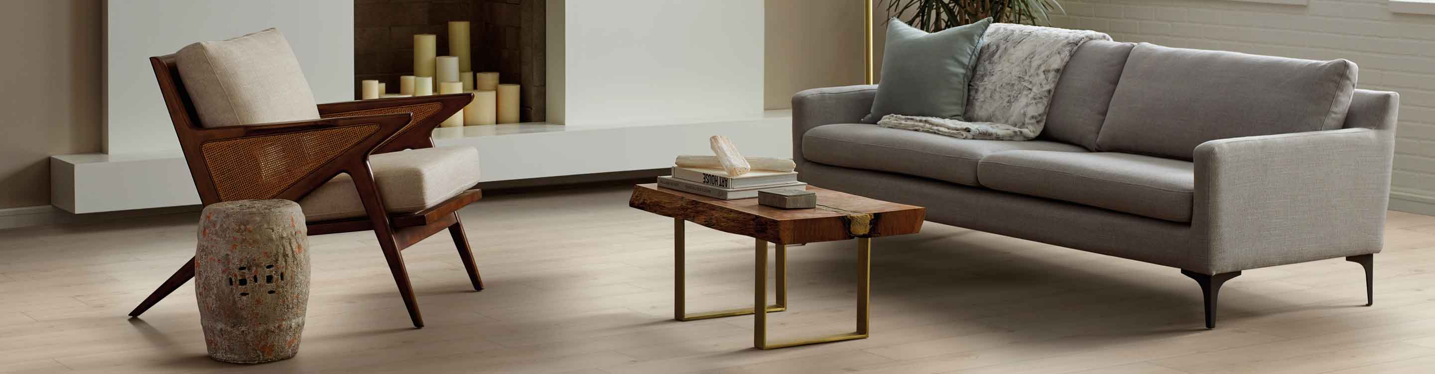 Vinyl flooring in Easley, SC, living room with couch, chair, and coffee table