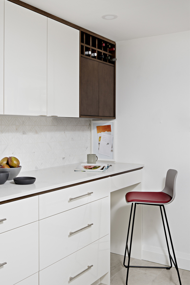 Office space built into kitchen cabinet nook